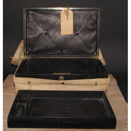 394 - A Victorian morocco leather rectangular document or despatch box, hinged cover with flush brass camp... 