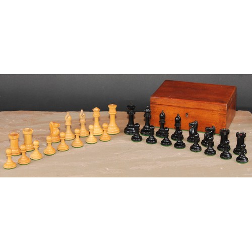 117 - A boxwood and ebonised Staunton chess set, marked for King’s side, the Kings 7cm high, mahogany box