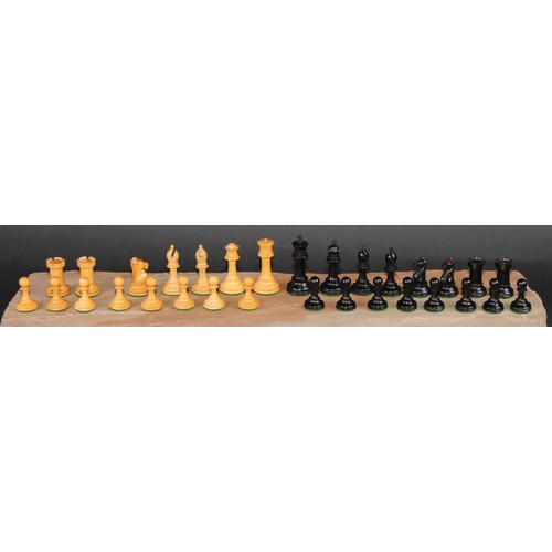 117 - A boxwood and ebonised Staunton chess set, marked for King’s side, the Kings 7cm high, mahogany box