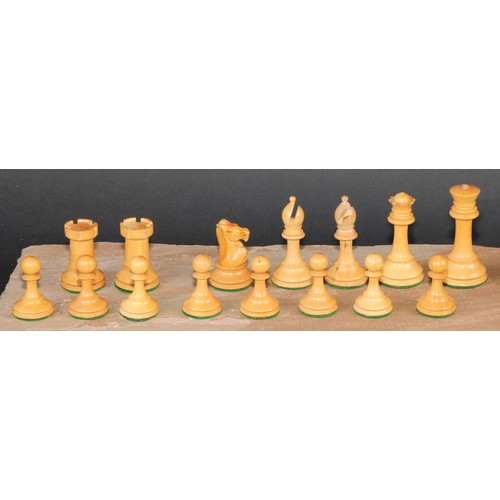 117 - A boxwood and ebonised Staunton chess set, marked for King’s side, the Kings 7cm high, mahogany box