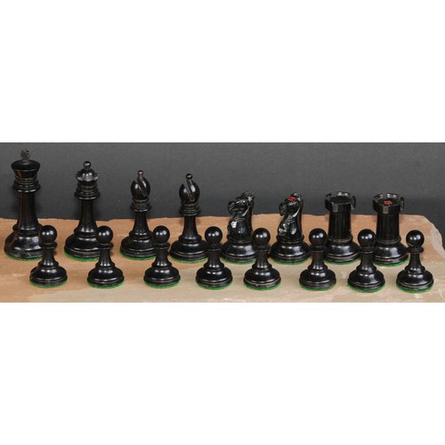 117 - A boxwood and ebonised Staunton chess set, marked for King’s side, the Kings 7cm high, mahogany box