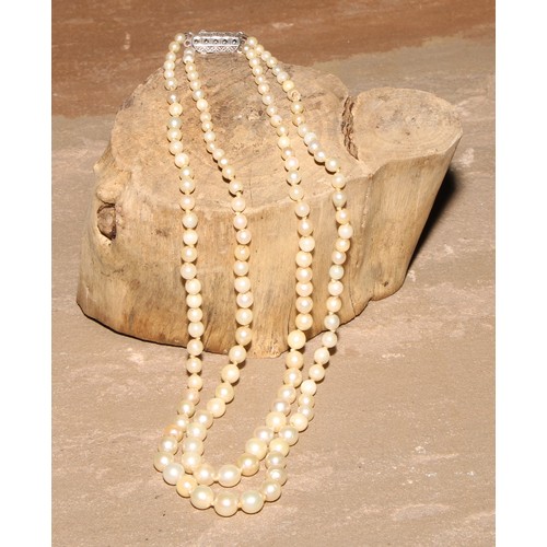 201 - A cultured pearl necklace, silver clasp, 40cm drop, Mappin & Webb retailer's box