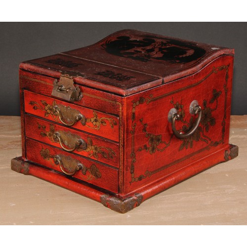 175 - A Chinese red lacquer table top vanity chest, hinged cover enclosing a folding mirror, above three d... 