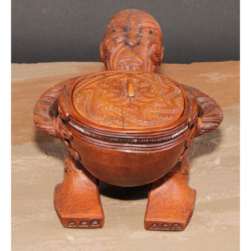 823 - A Maori figural pouaka box, carved overall with puhoro, 18.5cm wide, New Zealand