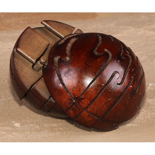 740 - Treen - a 19th century boxwood puzzle ball, approx. 7.5cm diameter