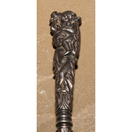 209 - A fine William IV silver fruit fork, the sculptural handle cast and chased with putti and scrolling ... 