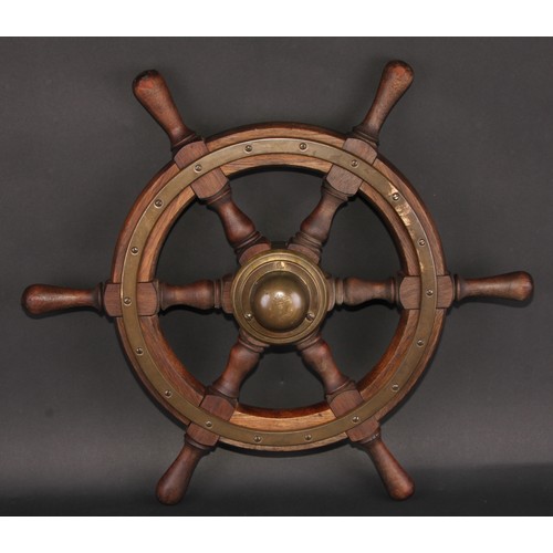 614 - Maritime Interest - an early 20th century brass mounted teak ships wheel, turned spokes and handles,... 