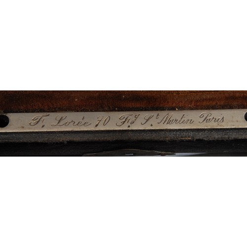 765 - An oboe, by F Lore, Paris, plated keys, no.Q18, 60cm long, cased