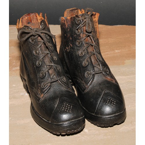 337 - A pair of late 19th century leather child's leather boots, hobnail soles, 18cm long, c.1900