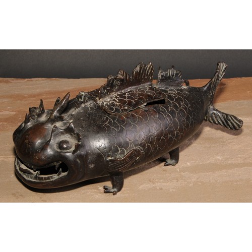 143 - A Chinese bronze incense burner, as a carp, 28cm long