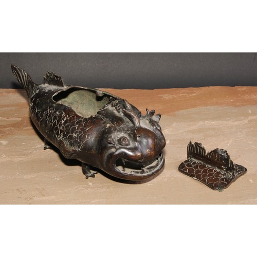 143 - A Chinese bronze incense burner, as a carp, 28cm long