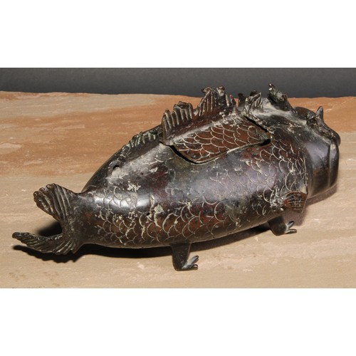 143 - A Chinese bronze incense burner, as a carp, 28cm long