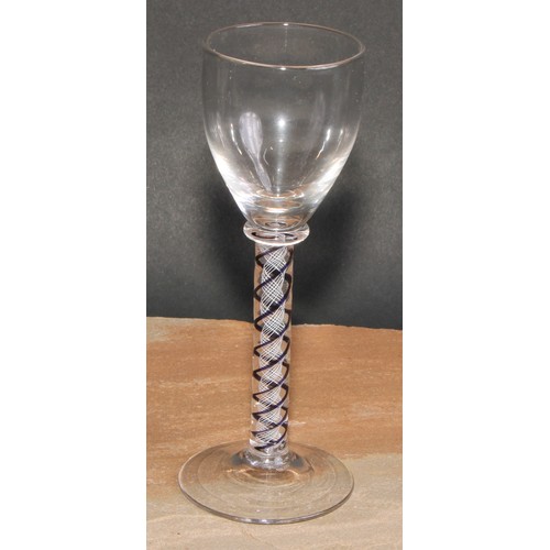 418 - An 18th century trumpet shaped wine glass, drawn stem with tear inclusion, 17cm high; a coloured twi... 