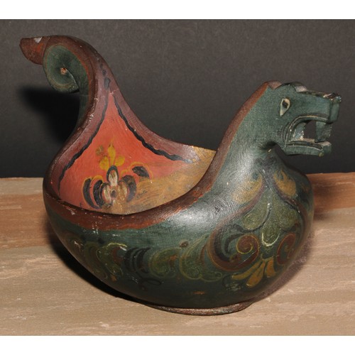 672 - Treen - a Norwegian kasa, carved with a dragon mask and painted in polychrome with scrolling leaves ... 