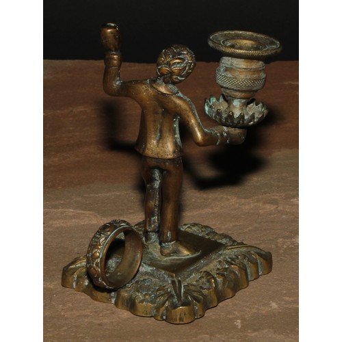 29 - A 19th century bronze figural so-to-bed, cast as a gentleman holding a campana sconce, loop handle, ... 