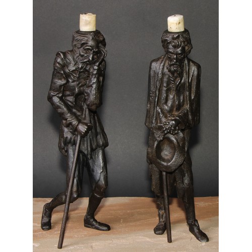 330 - A pair of French spelter figural caricature candlesticks, possibly after Emile Guillemin (1841 - 190... 