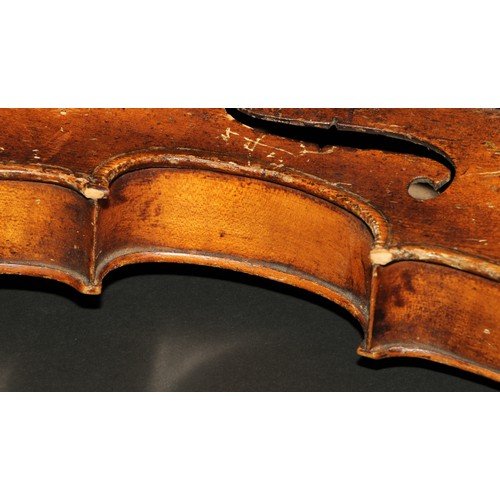 759 - A violin, the one-piece back 35.25cm long excluding button, boxwood tuning pegs, outlined with purfl... 