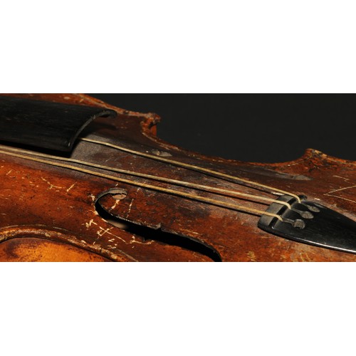 759 - A violin, the one-piece back 35.25cm long excluding button, boxwood tuning pegs, outlined with purfl... 