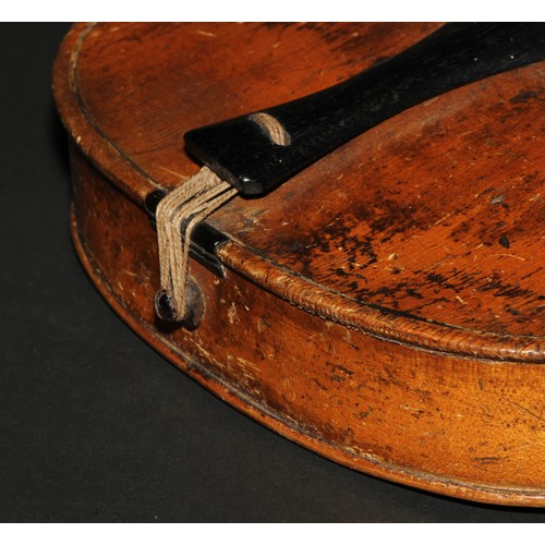 759 - A violin, the one-piece back 35.25cm long excluding button, boxwood tuning pegs, outlined with purfl... 