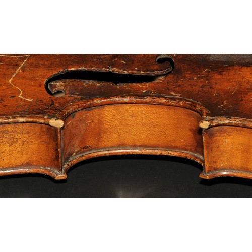 759 - A violin, the one-piece back 35.25cm long excluding button, boxwood tuning pegs, outlined with purfl... 