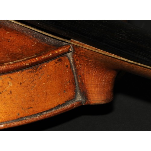 759 - A violin, the one-piece back 35.25cm long excluding button, boxwood tuning pegs, outlined with purfl... 