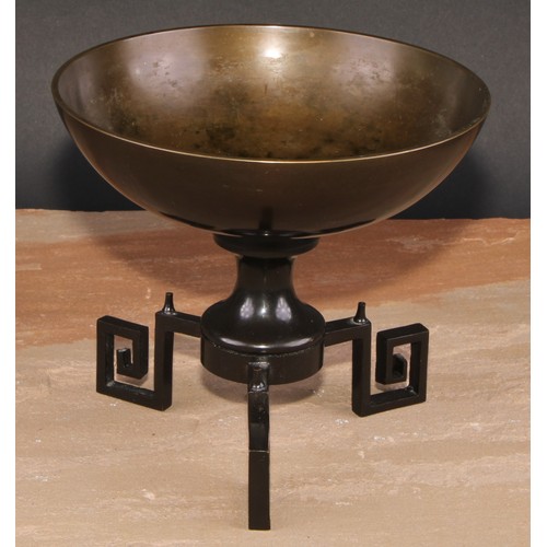 133 - A brown patinated bronze table centre tazza, tripod base with Greek key scroll feet, 18.5cm diam, le... 