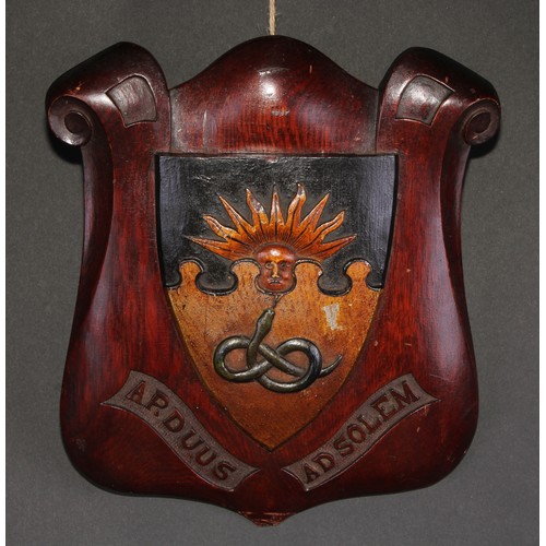 80 - A 19th century oak armorial shield, carved and polychrome painted with the arms and motto of Victori... 