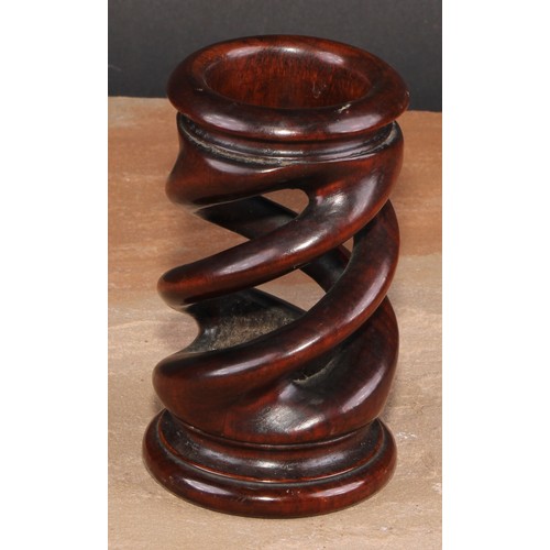 670 - Treen - a 19th century turned mahogany open twist vase, 11cm high