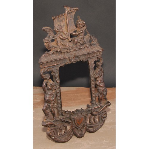 351 - A pair of Victorian cast iron photograph frames, each crested by putti rowing a boat, 37cm high, Rd.... 