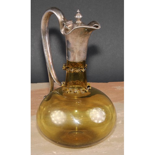 270 - A late Victorian E.P.N.S mounted amber flashed glass ovoid claret jug, hinged cover above two traile... 