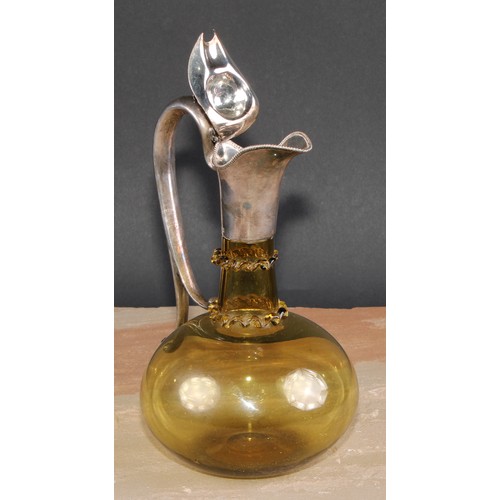 270 - A late Victorian E.P.N.S mounted amber flashed glass ovoid claret jug, hinged cover above two traile... 