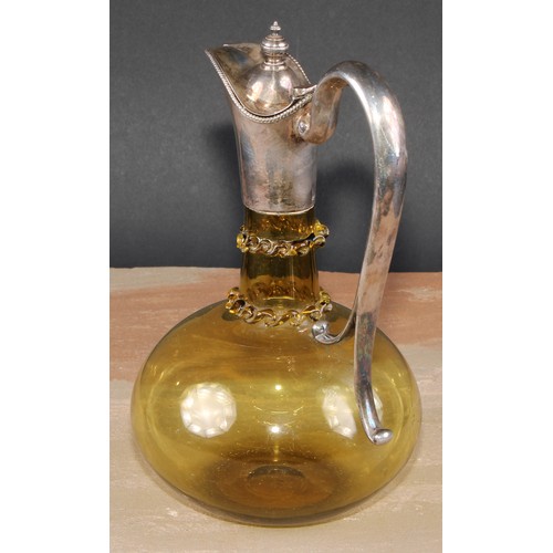 270 - A late Victorian E.P.N.S mounted amber flashed glass ovoid claret jug, hinged cover above two traile... 