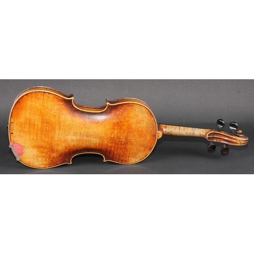 760 - A violin, the one-piece back 36.5cm long excluding button, outlined throughout with purfling, 59.5cm... 