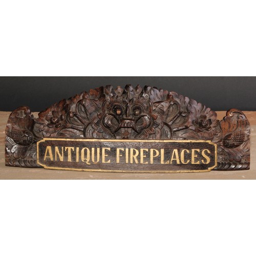 506 - Architectural Antiques and Reclamation - an early 20th century carved and parcel-gilt advertising pl... 