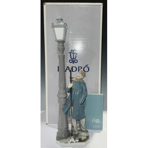 599 - A Lladro figure, Lamplighter, number 05205, 48cm, boxed