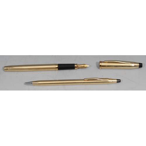 708 - A Cross 18ct gold plated fountain pen and ball point pen set, the fountain pen with 18ct gold nib, m... 