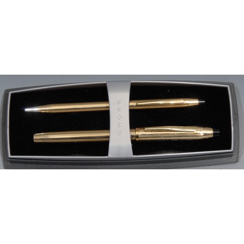 708 - A Cross 18ct gold plated fountain pen and ball point pen set, the fountain pen with 18ct gold nib, m... 