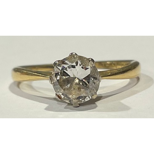 616 - An 18ct gold diamond solitaire ring, the stone approx. 0.7ct, platinum claw set bezel, ring size L, ... 