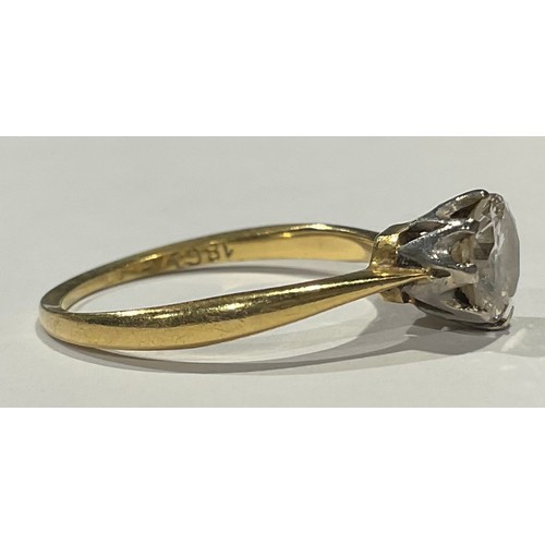 616 - An 18ct gold diamond solitaire ring, the stone approx. 0.7ct, platinum claw set bezel, ring size L, ... 