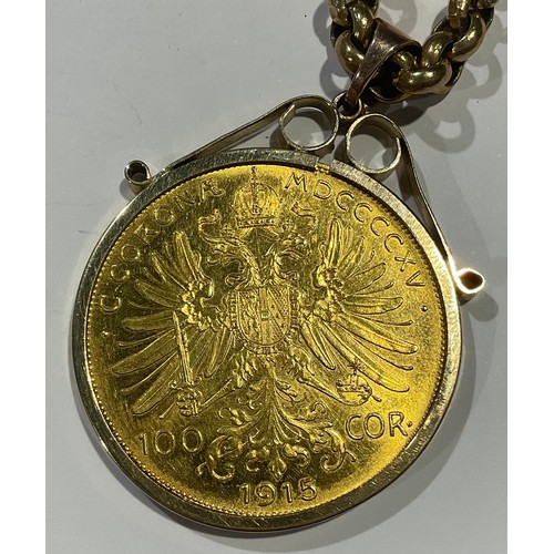 627 - A gold 100 Corona coin, 1915, mounted in 9ct gold as a pendant, suspended from a 9ct gold belcher li... 