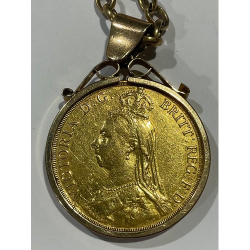 634 - A Victorian gold double sovereign, 1887, mounted in 9ct gold as a pendant, 9ct gold necklace chain, ... 