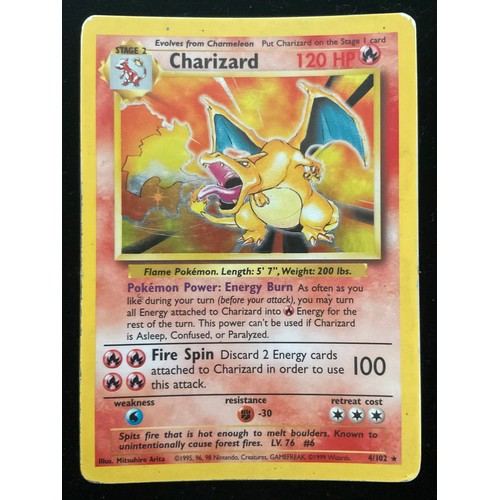 1368 - Pokémon Cards - Charizard 4/102 1999 holographic base set Pokémon card.