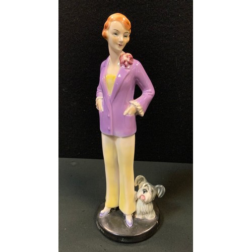 5 - An Art Deco Goebel figure, of a young lady and a dog, 24cm high, impressed monogram, model no. FF10,... 