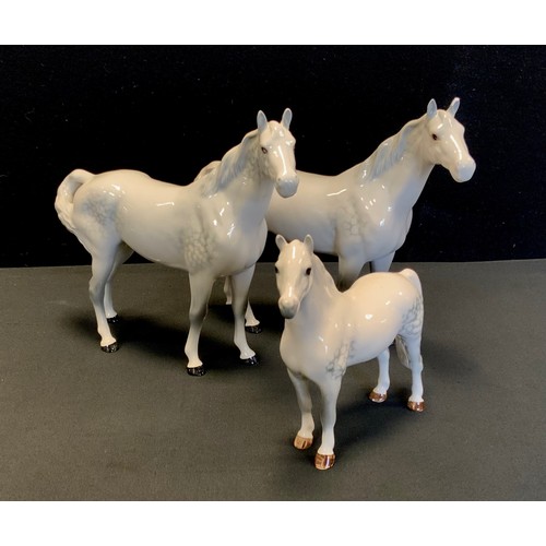 11 - Beswick - Two Beswick Welsh horses,21cm high, conforming foal (3)