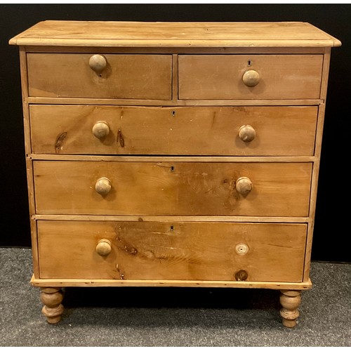 20 - A early Victorian pine chest of drawers; over-sailing top, pair of drawers to frieze over three grad... 