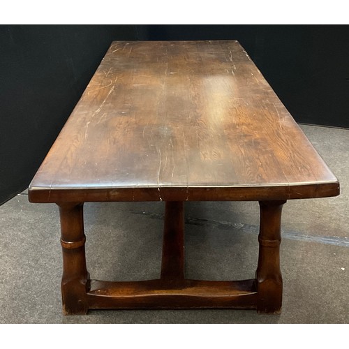 27 - A large 20th century oak refectory table, thick rectangular top, cannon barrel legs, H stretcher, 75... 