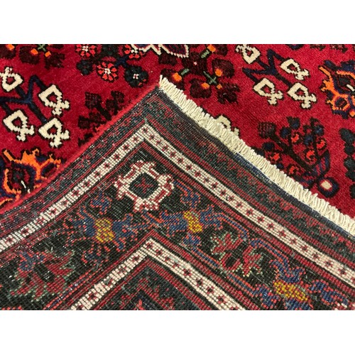 39 - A North west Persian Josheghan rug / carpet, central diamond-shaped medallion within a field of styl... 