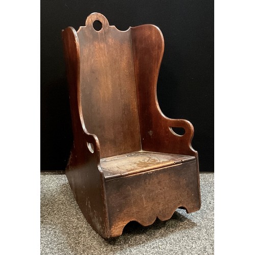 41 - A late 18th century boarded child’s rocking chair/ commode, hinged seat, comprising of various woods... 