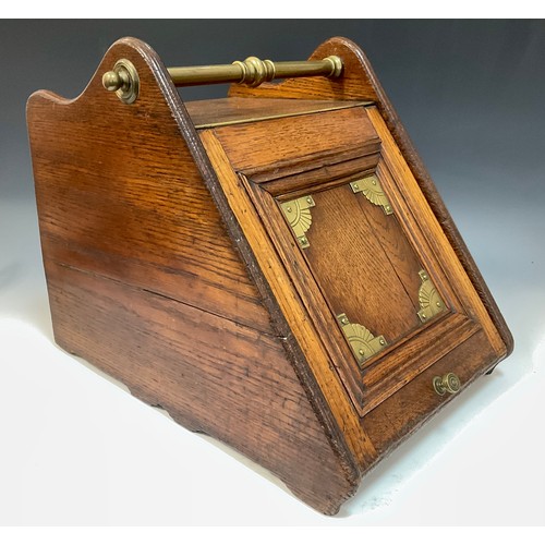 51 - A late 19th century Aesthetic movement oak purdonium/coal box, brass handle and mounts, with liner, ... 