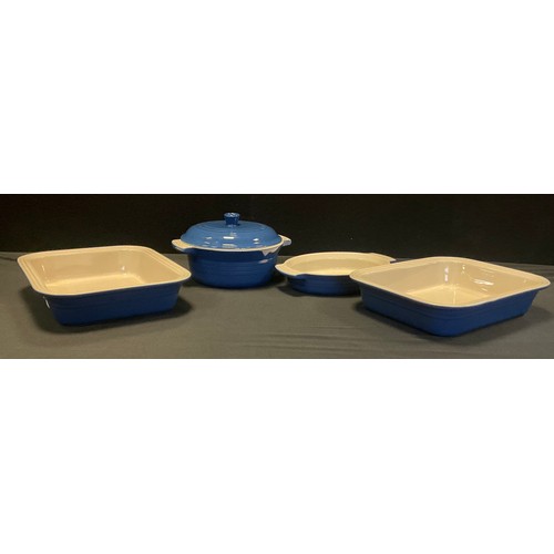 74 - Kitchenalia - a pair of Le Creuset oven dishes, 31cm,another and a lidded cooking pot (4)